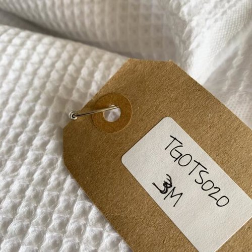 Tissu éponge, de couleur blanche, large de 145 cm, bio gots, en coton, vente par 50 cm de haut