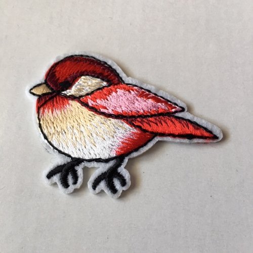 Appliqué, à coller au fer, bel oiseau tissé, rouge, beige et rose, qui mesure 6/4.5 cm, neuf, vendu à la pièce