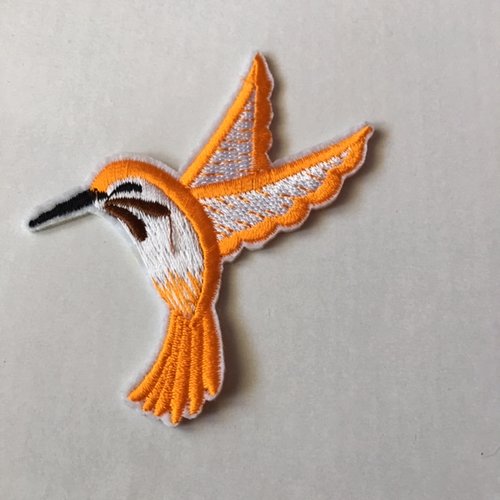 Appliqué, oiseau, à coller au fer, un colibri orange, blanc et noir, tissé, 7/7.5 cm, vendu à la pièce