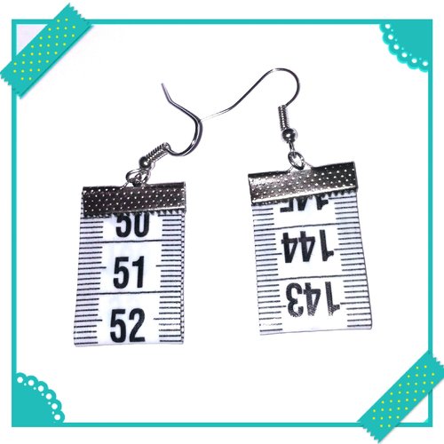 Boucles d'oreilles mètre ruban blanc