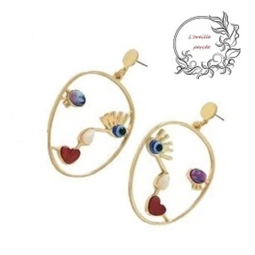 Boucle d'oreille grand visage