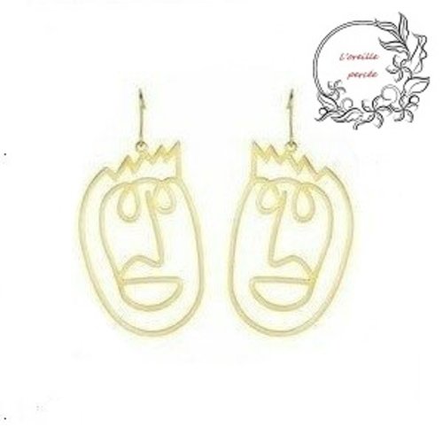Boucle d'oreille visage doré
