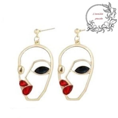 Boucle d'oreille visage abstrait