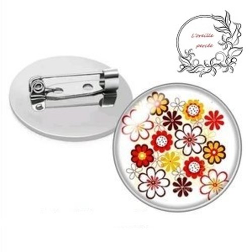 Broche ronde cabochon fleuri