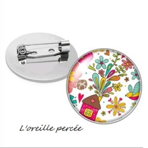 Broche ronde cabochon fleuri