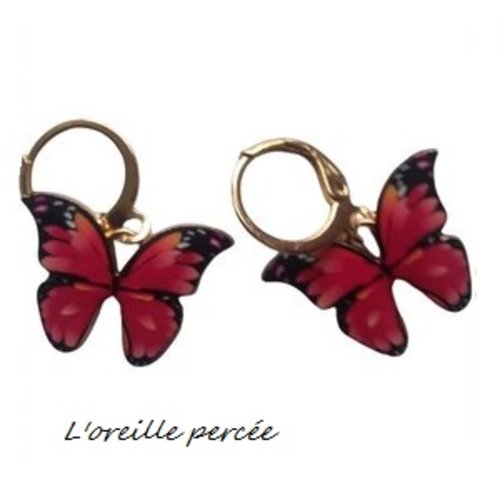 Boucle d'oreille papillon fuchsia