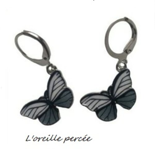 Boucle d'oreille papillon blanc/gris