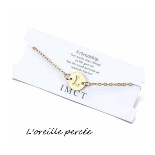 Bracelet doré lettre l