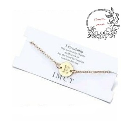 Bracelet doré lettre e