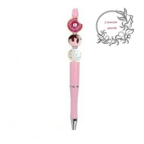 Stylo à bille rose et son donut
