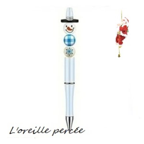 Stylo à bille blanc et son bonhomme de neige