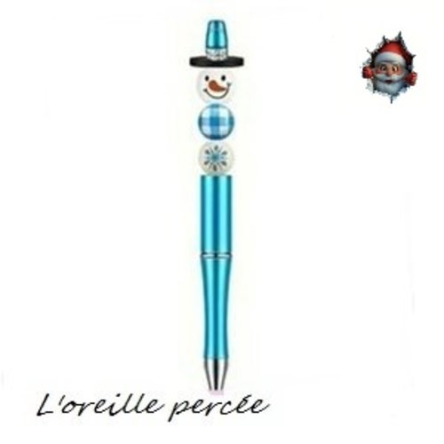 Stylo à bille bleu et son bonhomme de neige