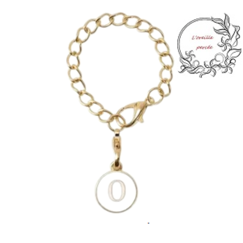Bijou de sac chaîne dorée et son médaillon blanc lettre o