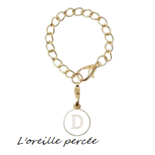 Bijou de sac chaîne dorée et son médaillon blanc lettre d