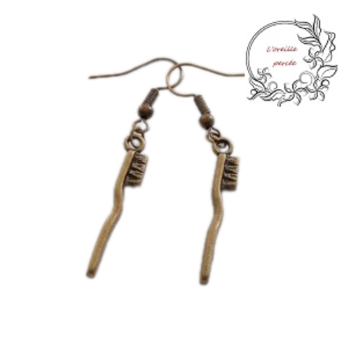Boucle d'oreille brosse à dent bronze
