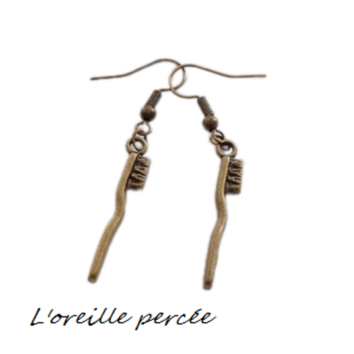 Boucle d'oreille brosse à dent bronze