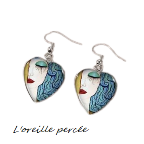 Boucle d'oreille visage abstrait