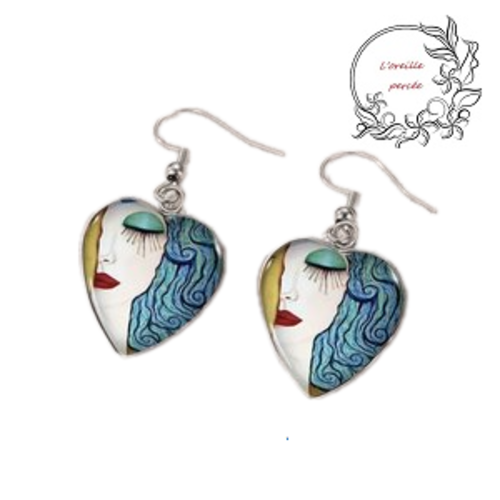 Boucle d'oreille visage abstrait