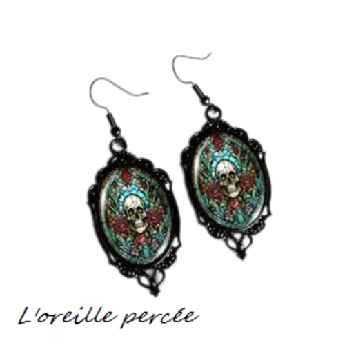 Boucle d'oreille tête de mort