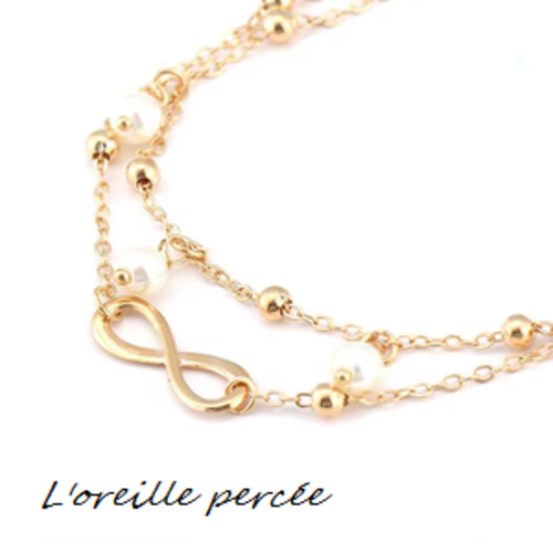 Chaîne de cheville et ses 5 papillons dorés