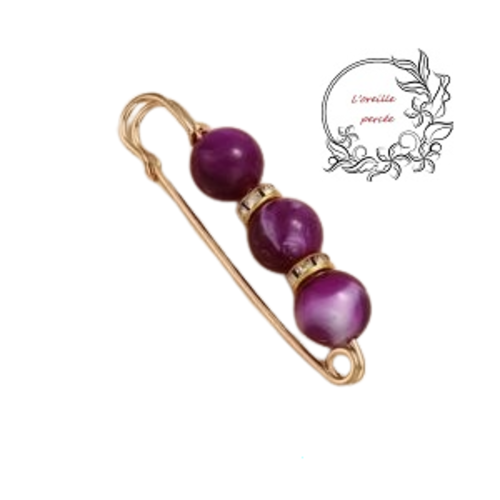 Broche épingle et ses perles rondes mauves irisées et ses rondelles strass