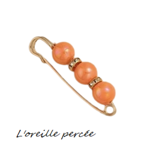 Broche épingle et ses perles rondes oranges à reflet et ses rondelles strass
