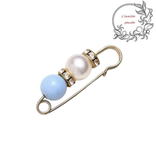 Broche épingle et sa perle ronde bleu clair et nacrée et ses rondelles strass
