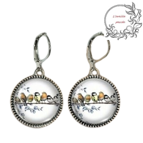 Boucle d'oreille nuée d'oiseaux sur une branche