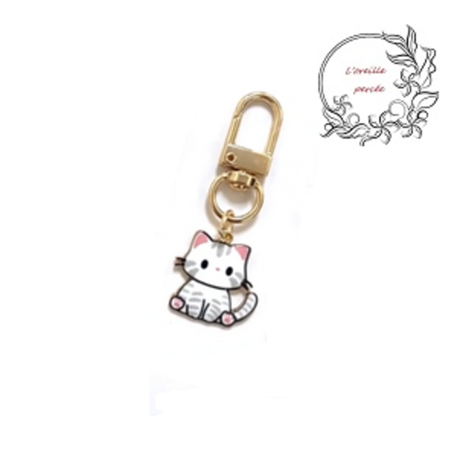 Porte clé chat blanc émail