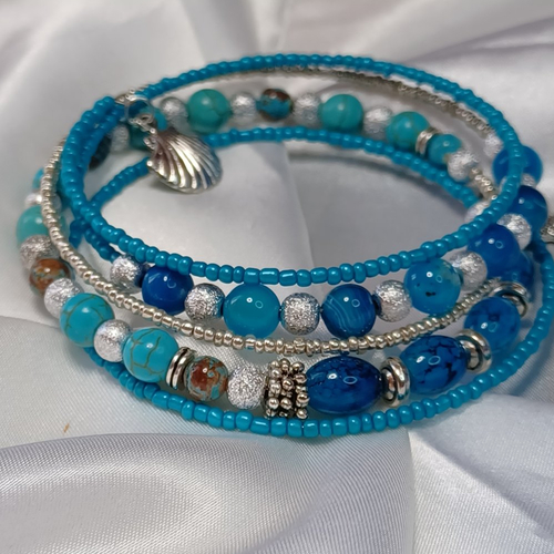 Bracelet multi rang fil mémoire couleur turquoise et argent