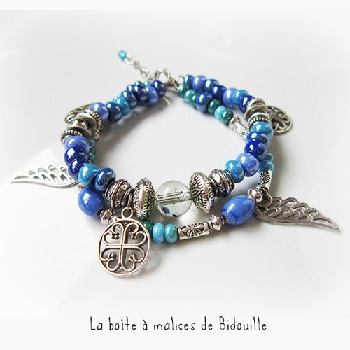Bracelet multirangs argenté - perles bleues et breloques