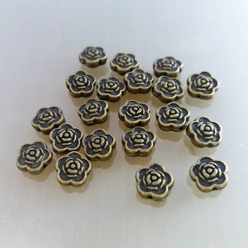 20 perles fleurs métal coloris bronze