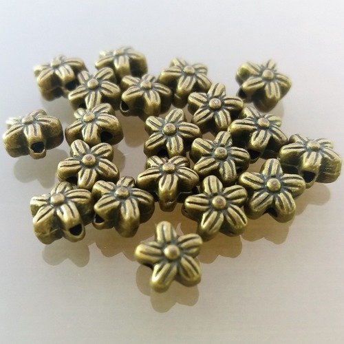 20 perles fleurs métal coloris bronze