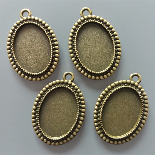 4 pendentifs pour cabochons ovales 25 mm x 18 mm métal coloris bronze