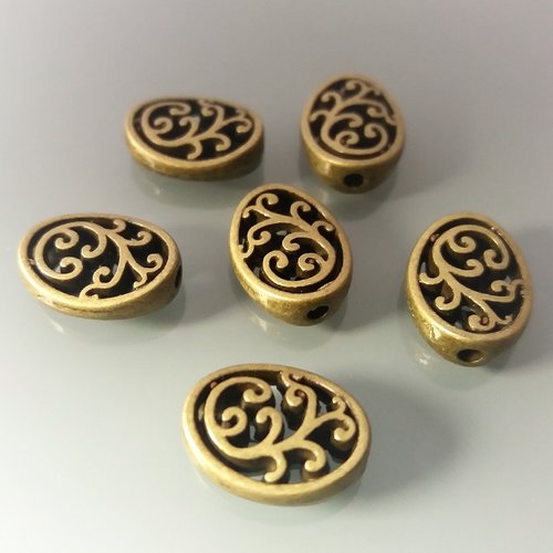 6 perles plates ovales ajourées en métal coloris bronze