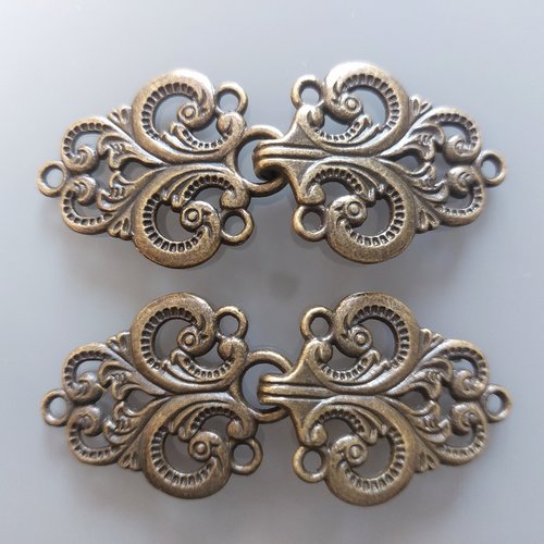 2 crochets fantaisies 6.5 cm à coudre métal coloris bronze