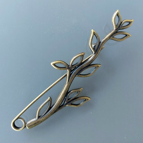 Broche 9 cm branche avec feuilles métal coloris bronze