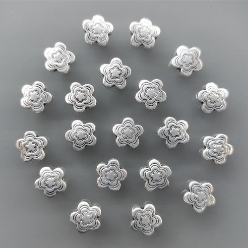 20 perles fleurs métal coloris argent