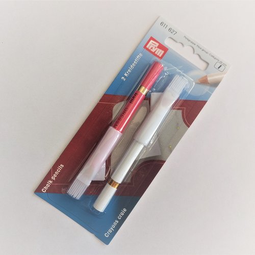 2 crayons craies rose et blanc avec brosse