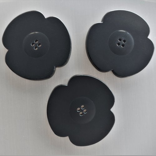 3 boutons fleurs 4 cm plastique coloris noir