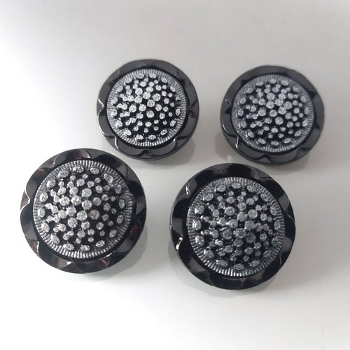 4 boutons 27 mm plastique coloris noir  et argent brillant