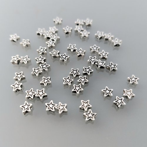 50 petites perles étoiles métal coloris argent
