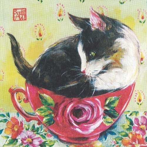 Serviette papier chat noir et blanc dans la tasse de fleurs