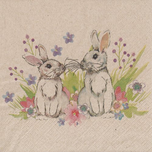 Serviette papier famille lapin dans les herbes