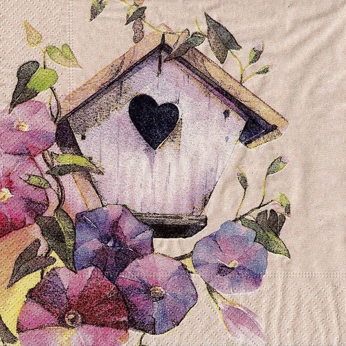 Serviette papier nichoir dans les fleurs