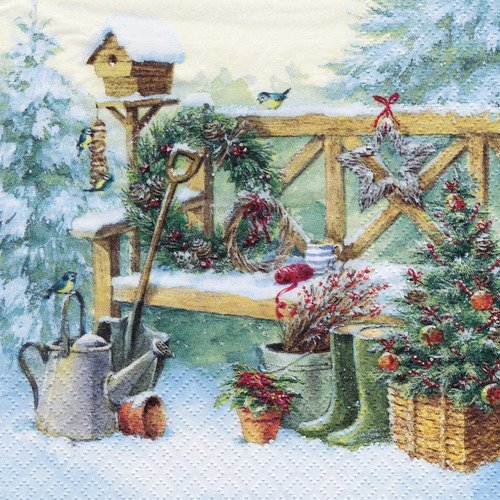Serviette le banc de noël dans la neige jardin