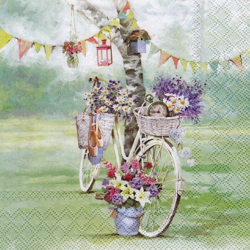 Serviette le vélo aux marguerites dans le jardin