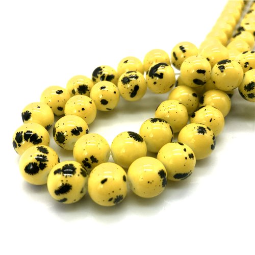 Perles verres : 25 rondes jaune/noire 6mm (19)