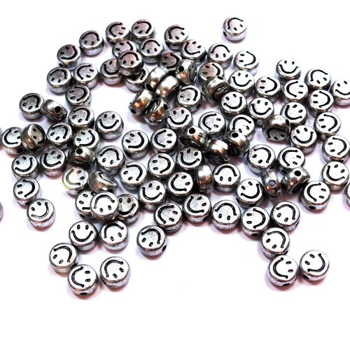 Perles acryliques : 50 rondes plates argentées avec motif visage noir 7mm