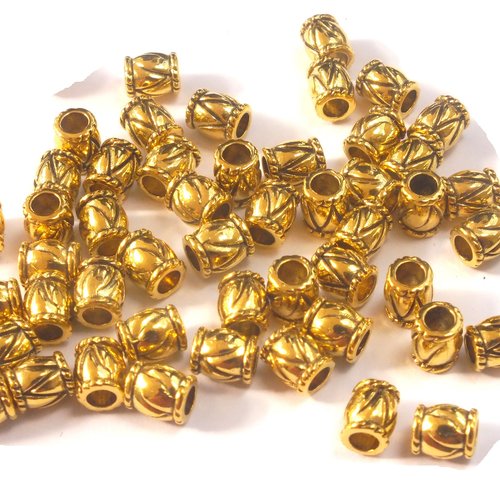 Lot 50 perles  : forme tonneau plaquées dorées fantaisies 5.5*4mm